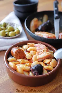 Fabada asturiana bean stew in a cazuela.