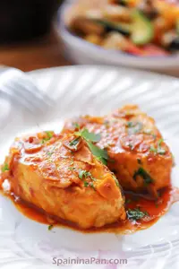 Spanish bacalao a la llauna cod on a plate.