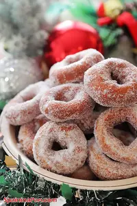 Spanish Christmas doughnuts in a bowl with christmas decoration.