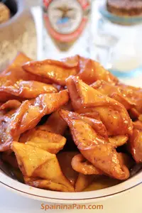 Spanish honey pestiños pastry in a bowl.