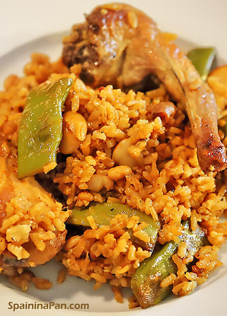 Authentic paella Valenciana on a plate. Authentic paella Valenciana on a plate.