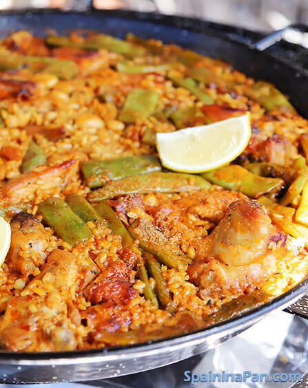 Authentic Spanish paella Valenciana in a pan. Authentic Spanish paella Valenciana in a pan.