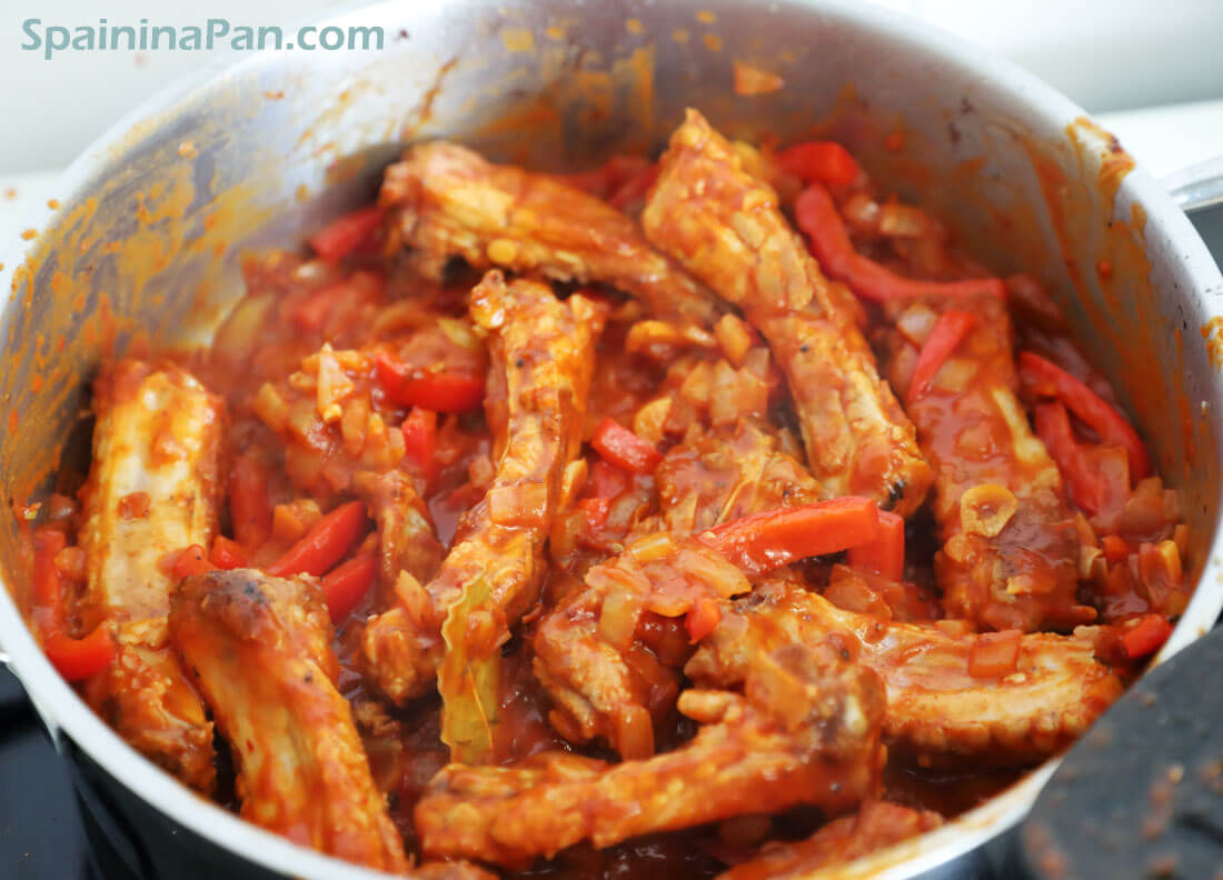 Spanish potato and ribs stew in a pan. Spanish potato and ribs stew in a pan.