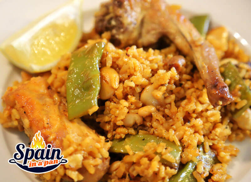 Authentic paella Valenciana on a plate.