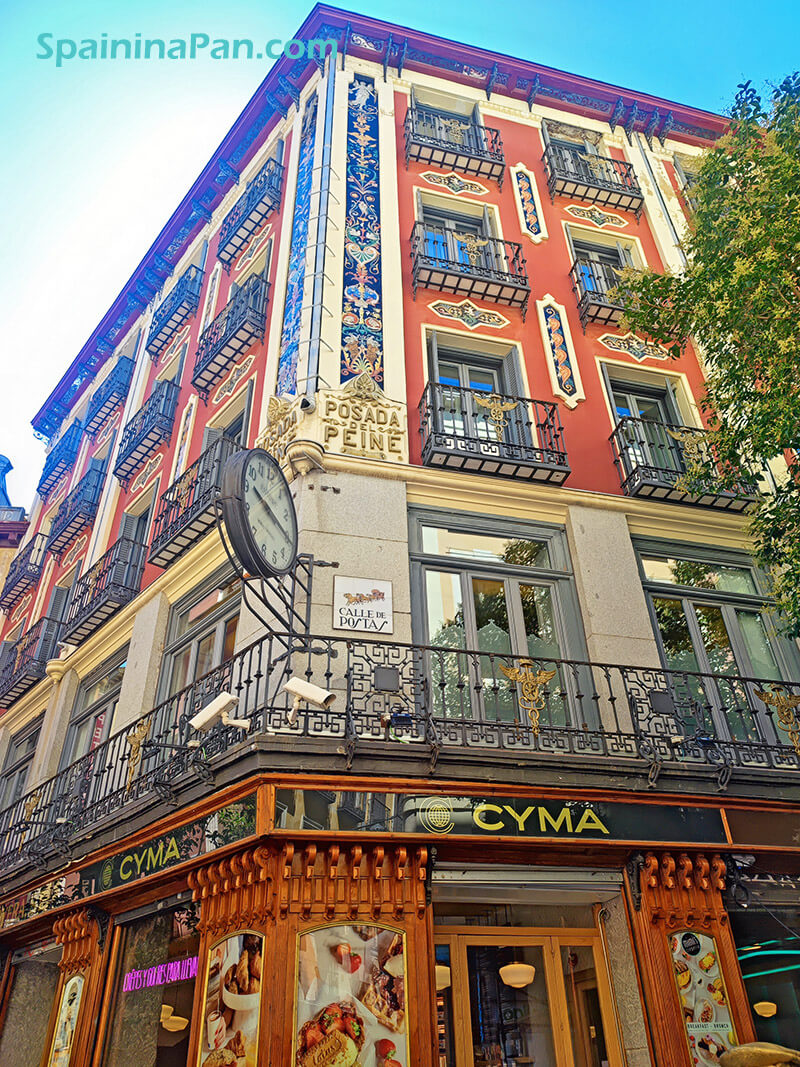 A corner building with classic architecture in Madrid.
