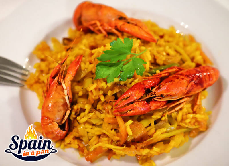 Spanish crayfish paella on a plate.
