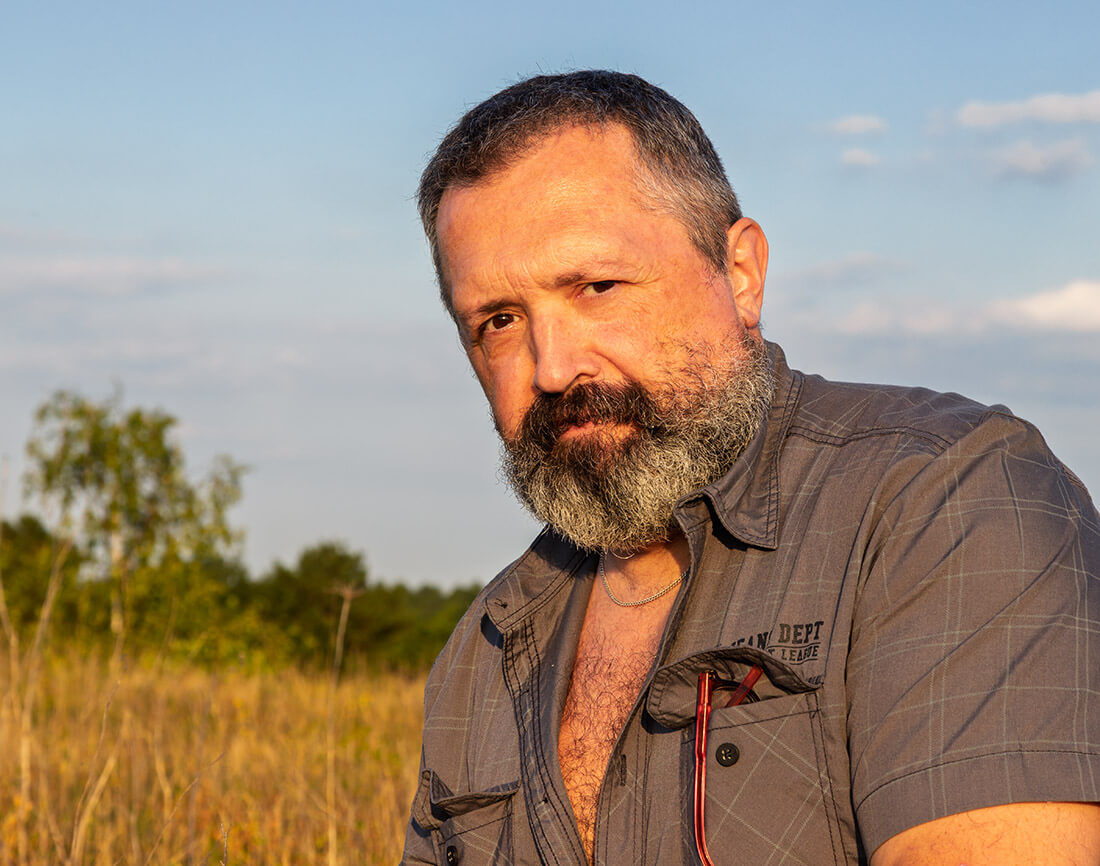 Chef Edu Valor outdoors in the sunset.