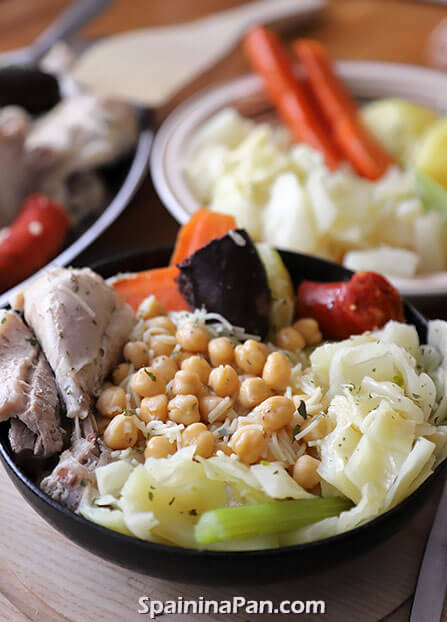 Madrilenian cocido chickpea stew in a bowl.