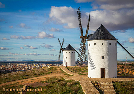The landscape of La Mancha, Spain with its typical mills.