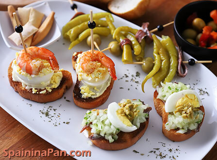 Bilbainito and Delicia Pintxos on a ceramic plate.