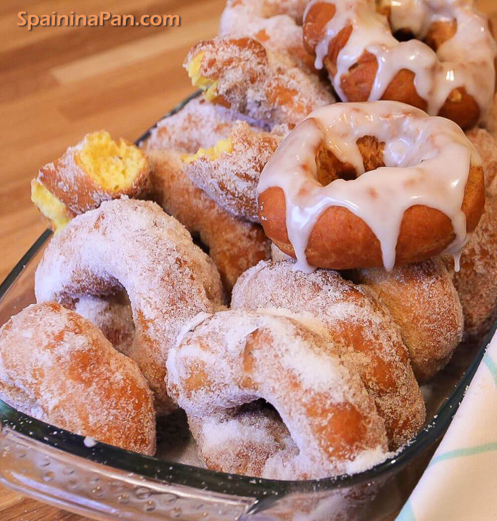 Spanish orange Christmas doughnuts in a tray.