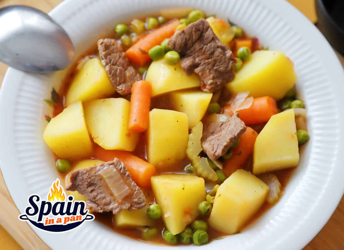 Spanish beef with potato stew on a plate.