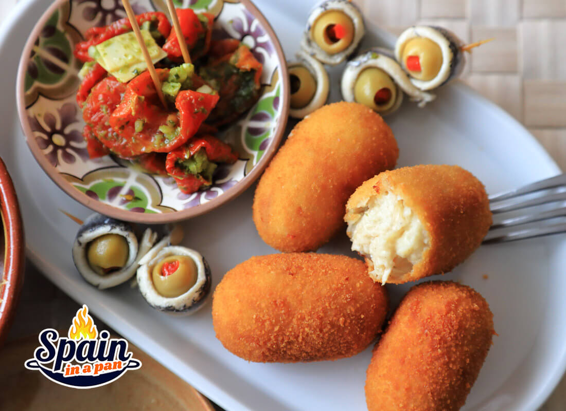 Spanish chicken croquettes with dried tomatoes.