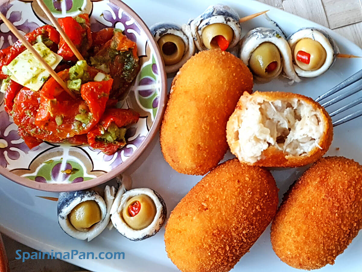 Spanish chicken croquettes with olives and dried tomatoes