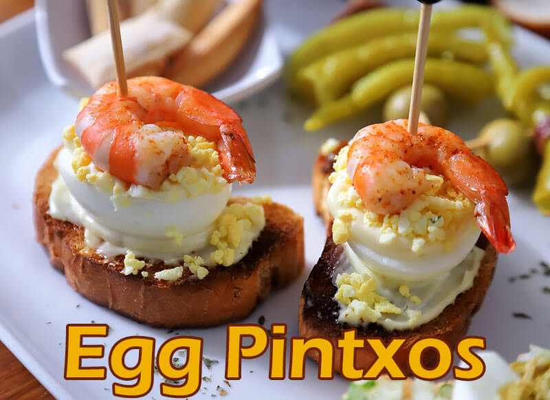Spanish egg pinchos on a plate.