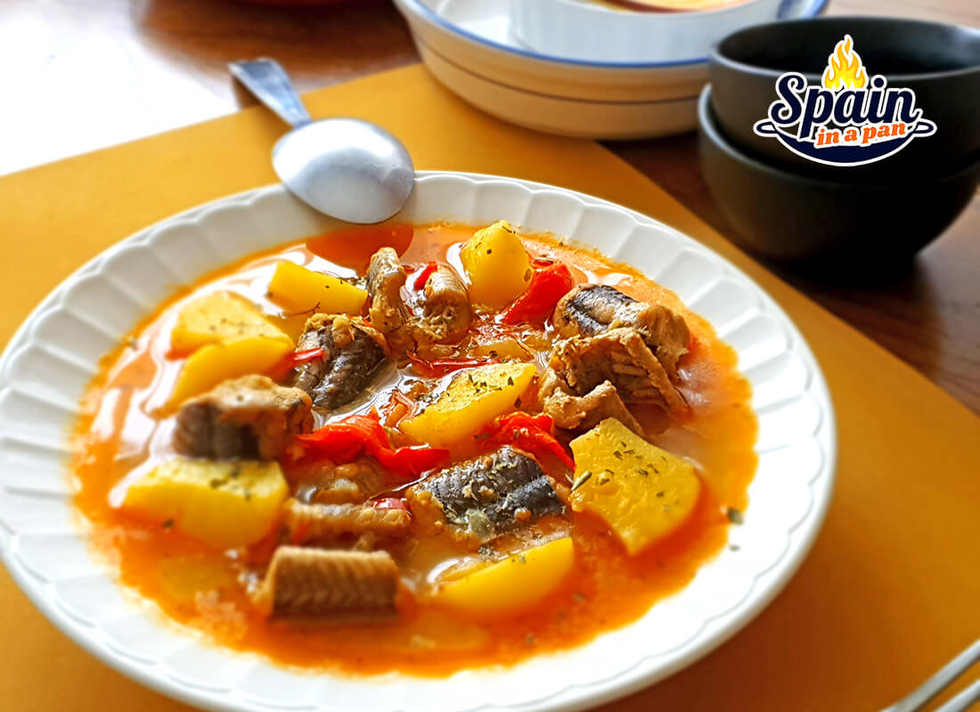 Spanish eel with potato stew on a dish. Spanish eel with potato stew on a dish.