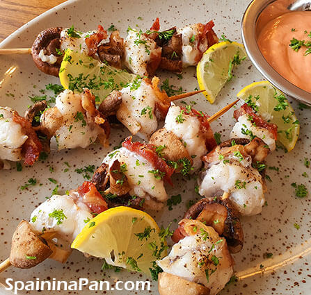 Spanish monkfish pincho with pink sauce.