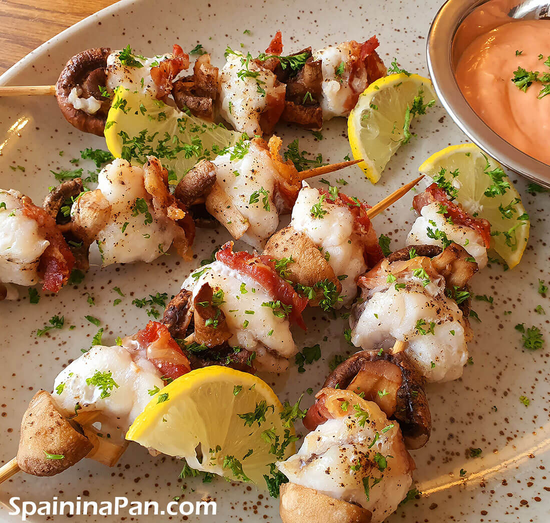 Spanish monkfish pincho with pink sauce.