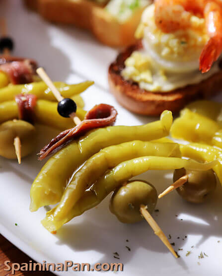 Spanish Gilda pinchos on a plate.