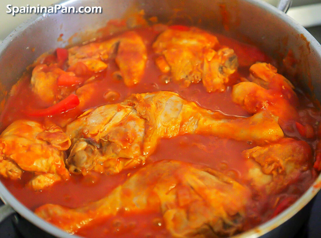 Spanish pollo al chilindron chicken in a pan..