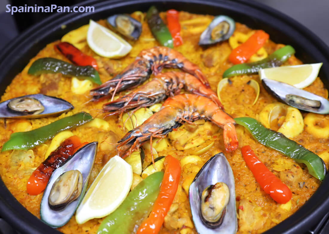 Spanish mixed paella or mixta in a pan.