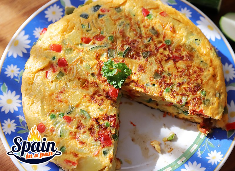 Spanish tortilla paisana on a decorative plate.