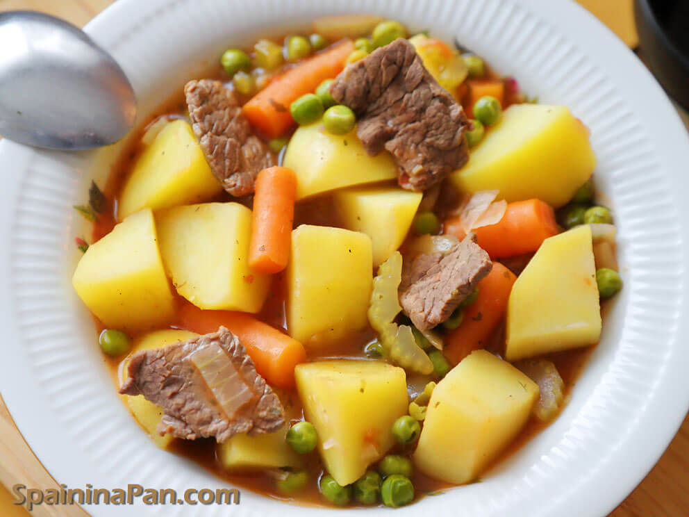 Spanish beef with potato stew on a ceramic plate. 